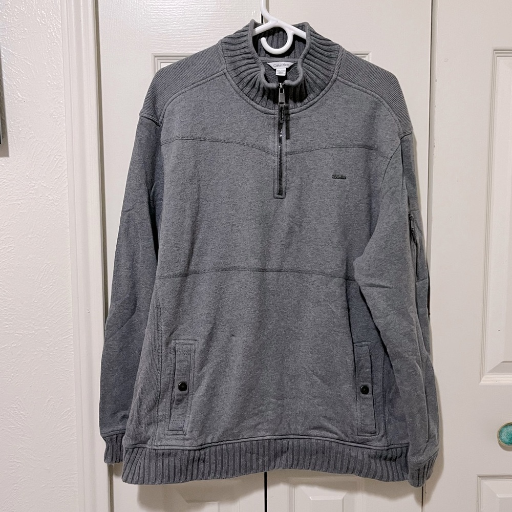 Calvin Klein men’s 1/4 zip grey sweater with zip pocket sleeveZ size XXL.